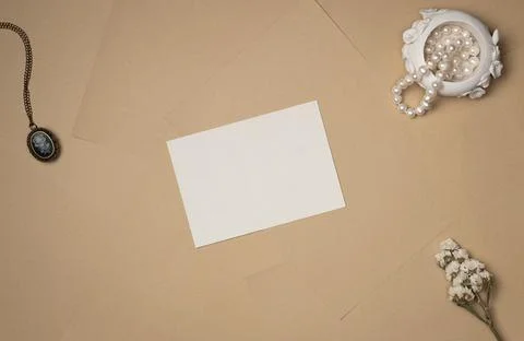 Empty white paper list with old accessories in vintage style on sheets of pap Stock Photos