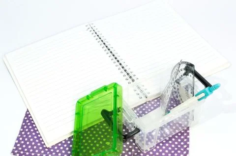 Empty white paper notebook with ruler, protractor, angle, triangle, square on 写真素材