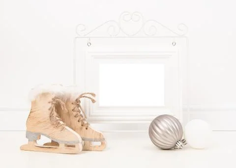 Empty white picture frame with space for text or wishes in a white living roo Stock Photos