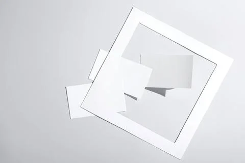 Empty white picture frames on a light grey background Stock Photos
