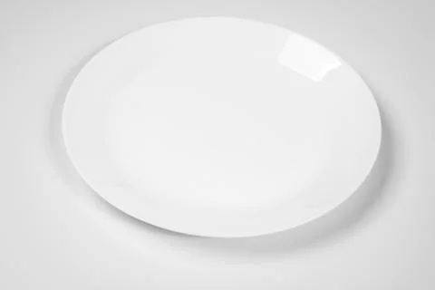Empty white plate Stock Photos