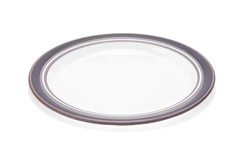Empty white plate on white background Stock Photos