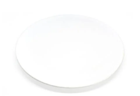 Empty white plate on a white background Stock Photos