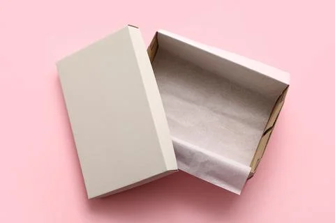 Empty white shoebox on pink background Stock Photos