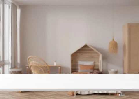 Empty white table top and blurred kids room interior on the background. Copy Stock Illustration