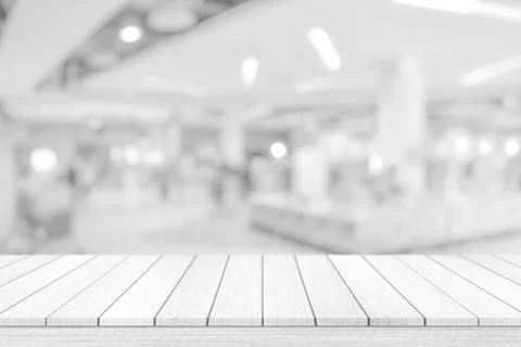 Empty white table top, counter over blur white bokeh light background. wooden 스톡 일러스트
