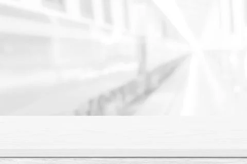 Empty white table top, counter over blur white bokeh light background. Empty  Stock Illustration