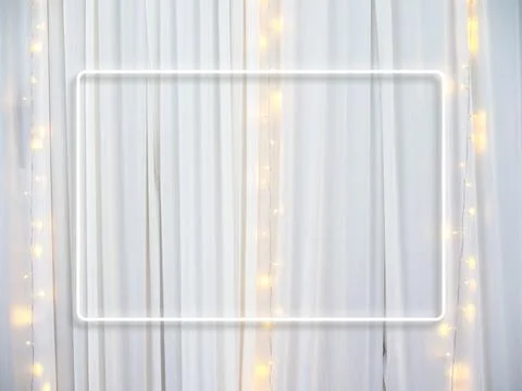 Empty white thin rectangular frame on white curtain background decoration w.. Stock Photos