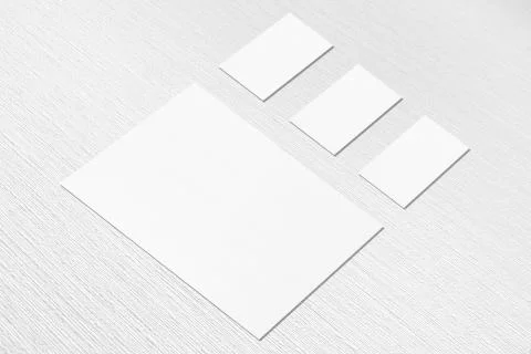 Empty white vertical poster and horizontal rectangle business card mockups in Stock Photos