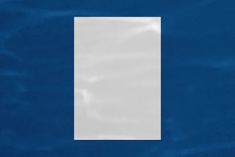 Empty white vertical poster mockup with water shadow and light caustic effect Stock Photos