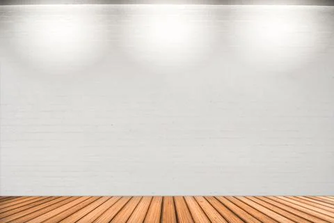 Empty white wall with 3 spot lights and wooden floor. Stock Photos