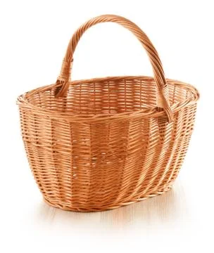 Empty wicker basket isolated on white Stock Photos