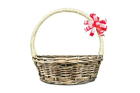 Empty wicker basket with red and gold ribbon isolated on white background Stock Photos