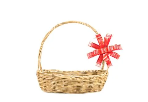 Empty wicker basket with red and gold ribbon isolated on white background Stock Photos