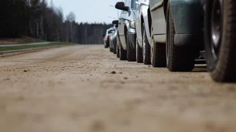 An empty winding scenic forest road with beautiful new asphalt on a summer da Stock Photos