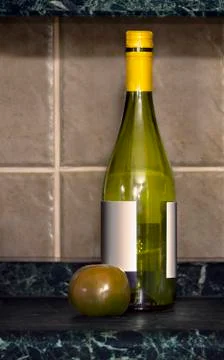 Empty wine bottle and one tomatoes Stock Photos