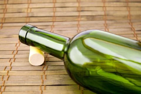 Empty wine bottle with cork Stock Photos