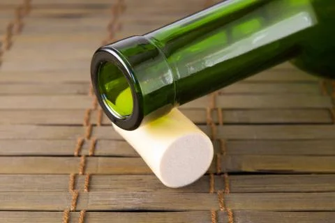 Empty wine bottle with cork Stock Photos
