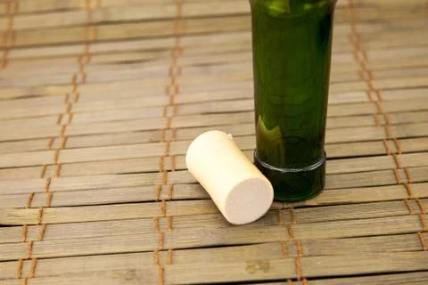 Empty wine bottle with cork Stock Photos