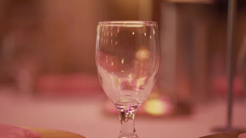 Empty wine glass wine.  Slow motion. Close up. Camera moves up. 4K Stock-Footage 247734633