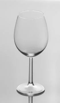 Empty wine glasses, isolated on white background Photos