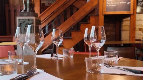 Empty Wine Glasses on a Restaurant Table in Saint Emilion France Stock Footage 334362460