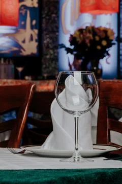 Empty wine glasses on the restaurant's dining table Stock Photos
