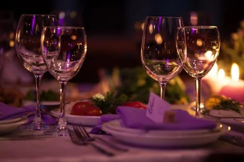 Empty wine glasses set in restaurant Stock Photos