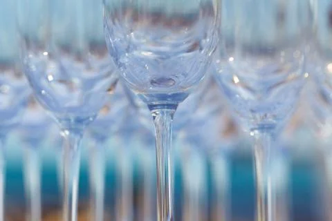 Empty wine glasses setting for wedding party. Stock Photos