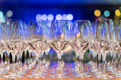 Empty wine glasses standing in rows ready for celebration Fotos Stock