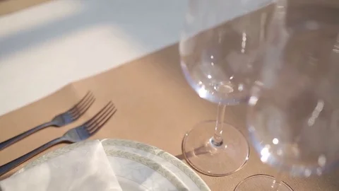 Empty wine glasses on table Stock Footage 74136970