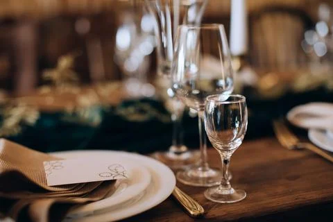 Empty wine glasses on the table in the restaurant Stock Photos