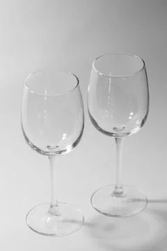 Empty wine glasses on a white background Stock Photos