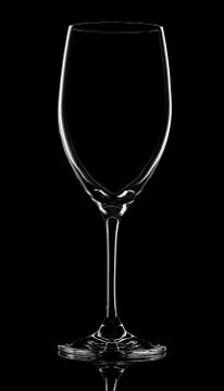 Empty wineglass on black background Stock Photos