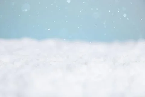 Empty winter background with white snow and blue sky. Christmas concept. Stock Photos