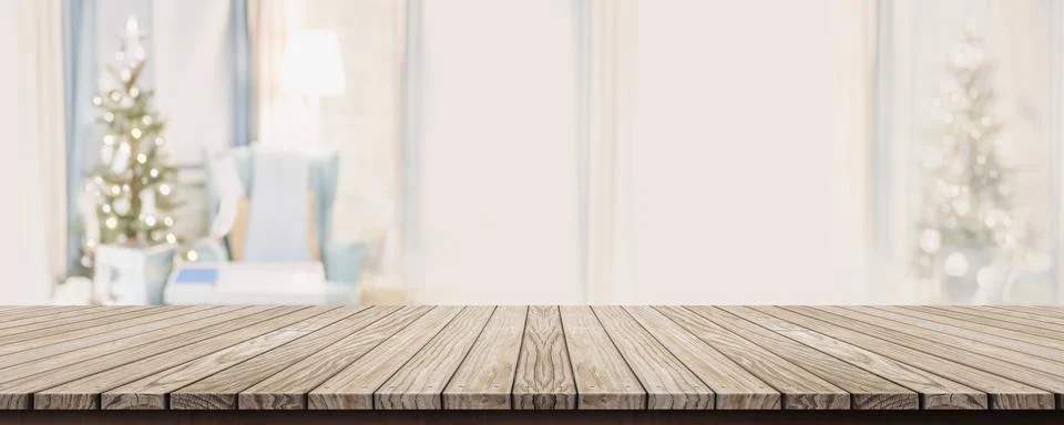 Empty wold plank table top with abstract warm living room decor with christma Stock Photos