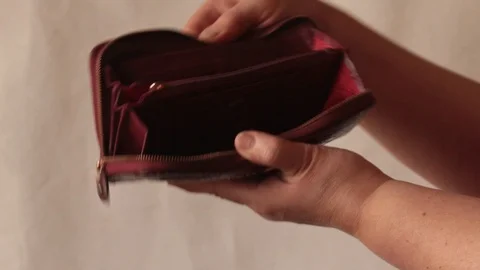 Empty woman's purse Stock Footage 98297942