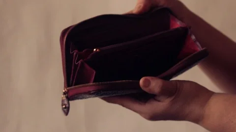 Empty woman's wallet Stock Footage 98297965