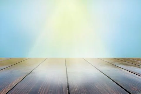 Empty wood plank table top with sunny rays. sunrays falling on vintage boards Stock Photos