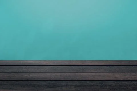Empty wood table with abstract green wall background. Stock Photos