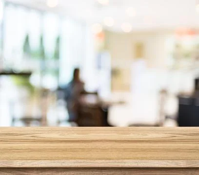Empty wood table and blurred cafe light background. product display template. Stock Photos