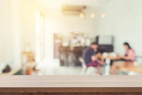 Empty wood table and Blurred background : Customer at coffee shop blur backgr Stock Photos