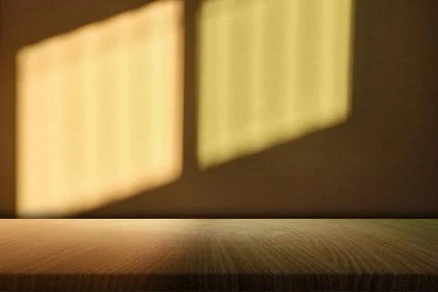 Empty Wood Table with Shadow and Natural Sunset Light on Wallpaper. Stock Photos