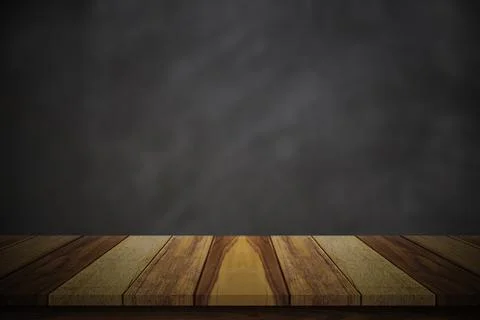 Empty wood table top over blur blackboard background. Stock Photos