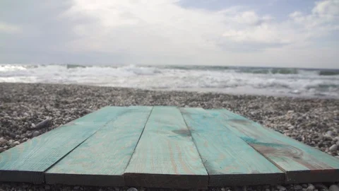 Empty wood table top on the sea beach blur background Stock Footage 125828675