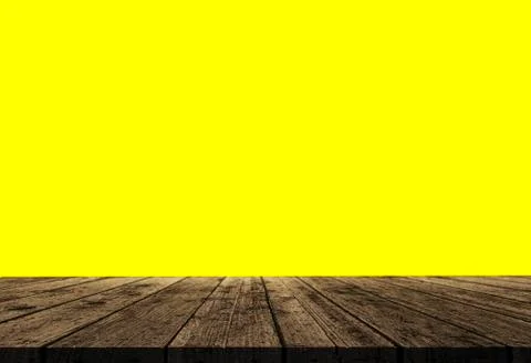 Empty of wood table top on yellow pastel color background.For montage product Stock Photos