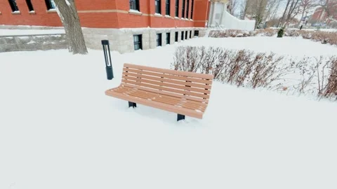 Empty Wooden Bench After Snowfall Stock Footage 323487161