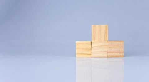 Empty wooden blocks lined up on a white background. Business concept. Stock Photos