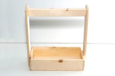 Empty wooden box. Made of pine, on a light white background. Stock Photos