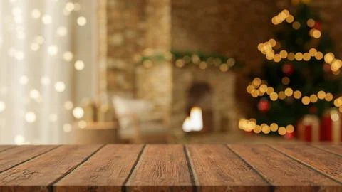 Empty wooden counter table across blurred Christmas tree and lighting firep.. Stock Illustration